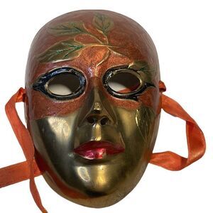 Festive solid brass mask.